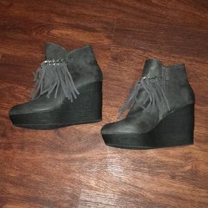 Wedged fringe booties